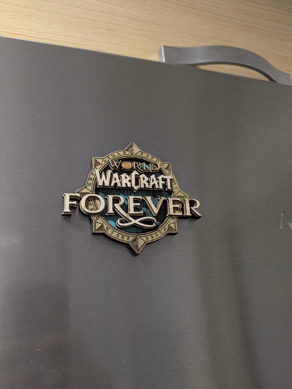 Imán para tu frigoríficio o PC inspirado en el logo de World of Warcraft Forever